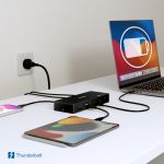 mbeat TB48 Thunderbolt 4 dock delivering 96W USB-C Power Delivery to MacBook Pro while simultaneously charging iPad and iPhone — 150W adapter included