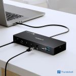 mbeat MB-DOCK-TB48 rear panel connected to MacBook Pro and Ethernet — showing HDMI 2.1, dual Thunderbolt 4, RJ45 2.5GbE, USB-C 10Gbps and USB-A 10Gbps ports in use